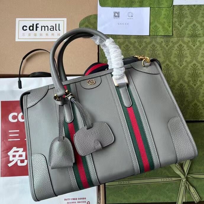 G*u*i top handle bags